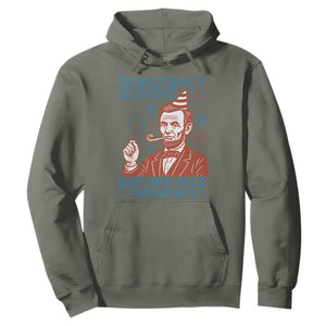 Funny 4th of July Satire Hoodie Democracy Is Dying But Hey Nice Fireworks Abe Lincoln TS02 Military Green Print Your Wear