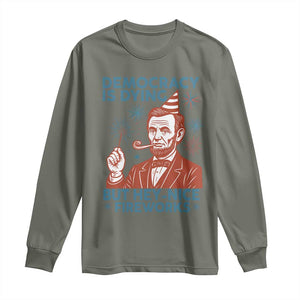 Funny 4th of July Satire Long Sleeve Shirt Democracy Is Dying But Hey Nice Fireworks Abe Lincoln TS02 Military Green Print Your Wear