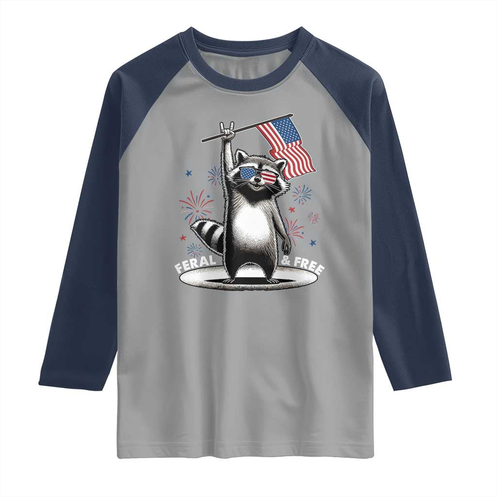 Funny Feral And Free Raglan Shirt 4th of July Patriotic Raccoon With American Flag Fireworks TS11 Sport Gray Navy Print Your Wear