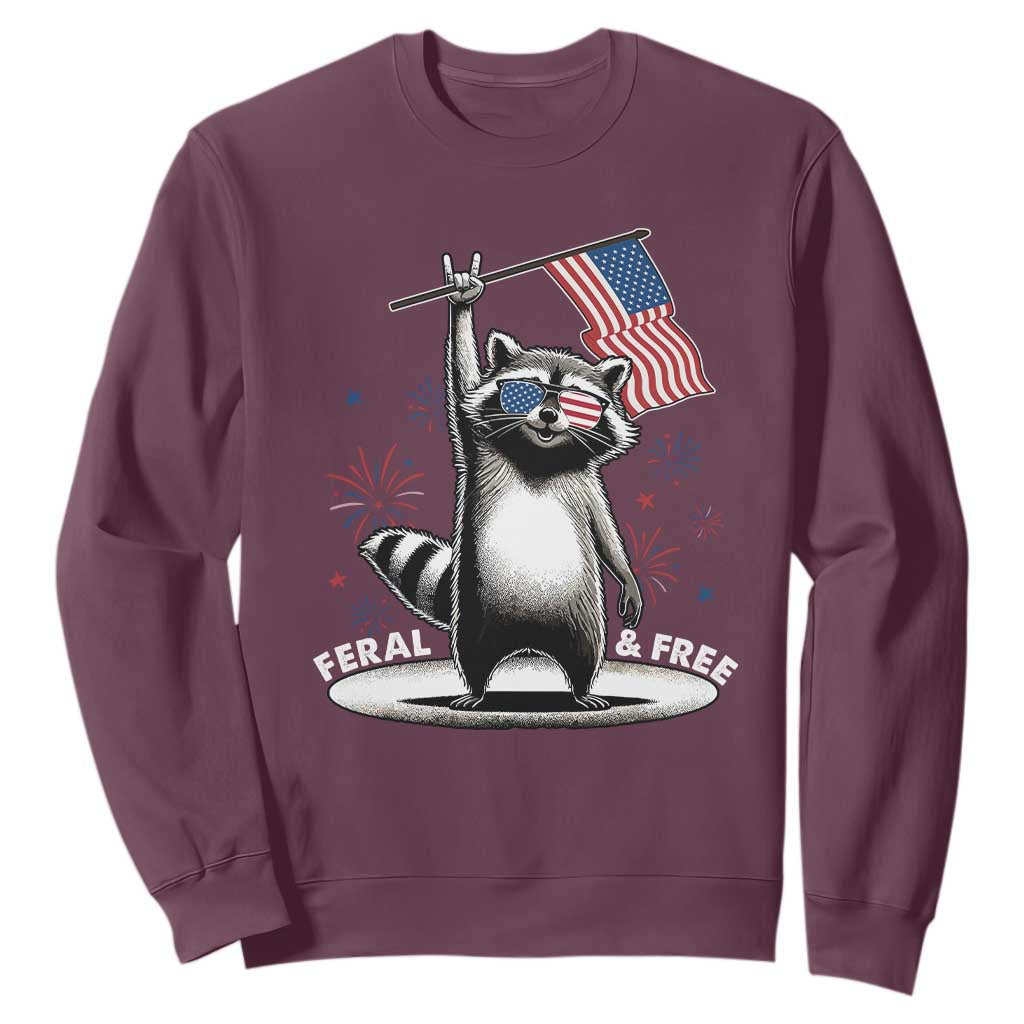 Funny Feral And Free Sweatshirt 4th of July Patriotic Raccoon With American Flag Fireworks TS11 Maroon Print Your Wear