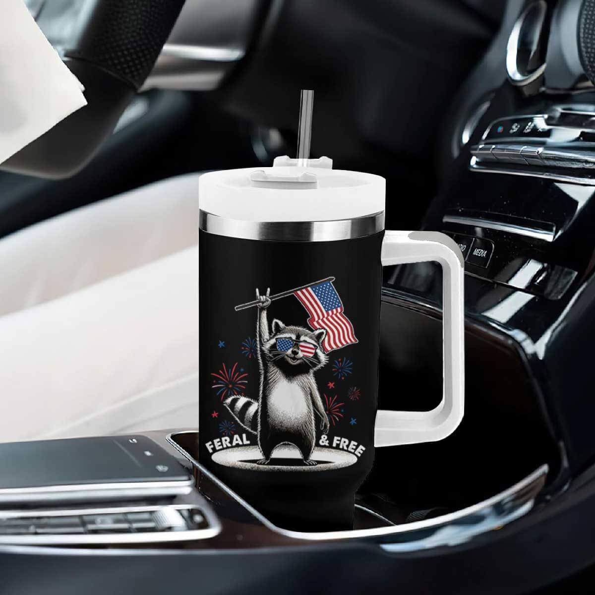 Funny Feral And Free Tumbler With Handle 4th of July Patriotic Raccoon With American Flag Fireworks TS11 Print Your Wear