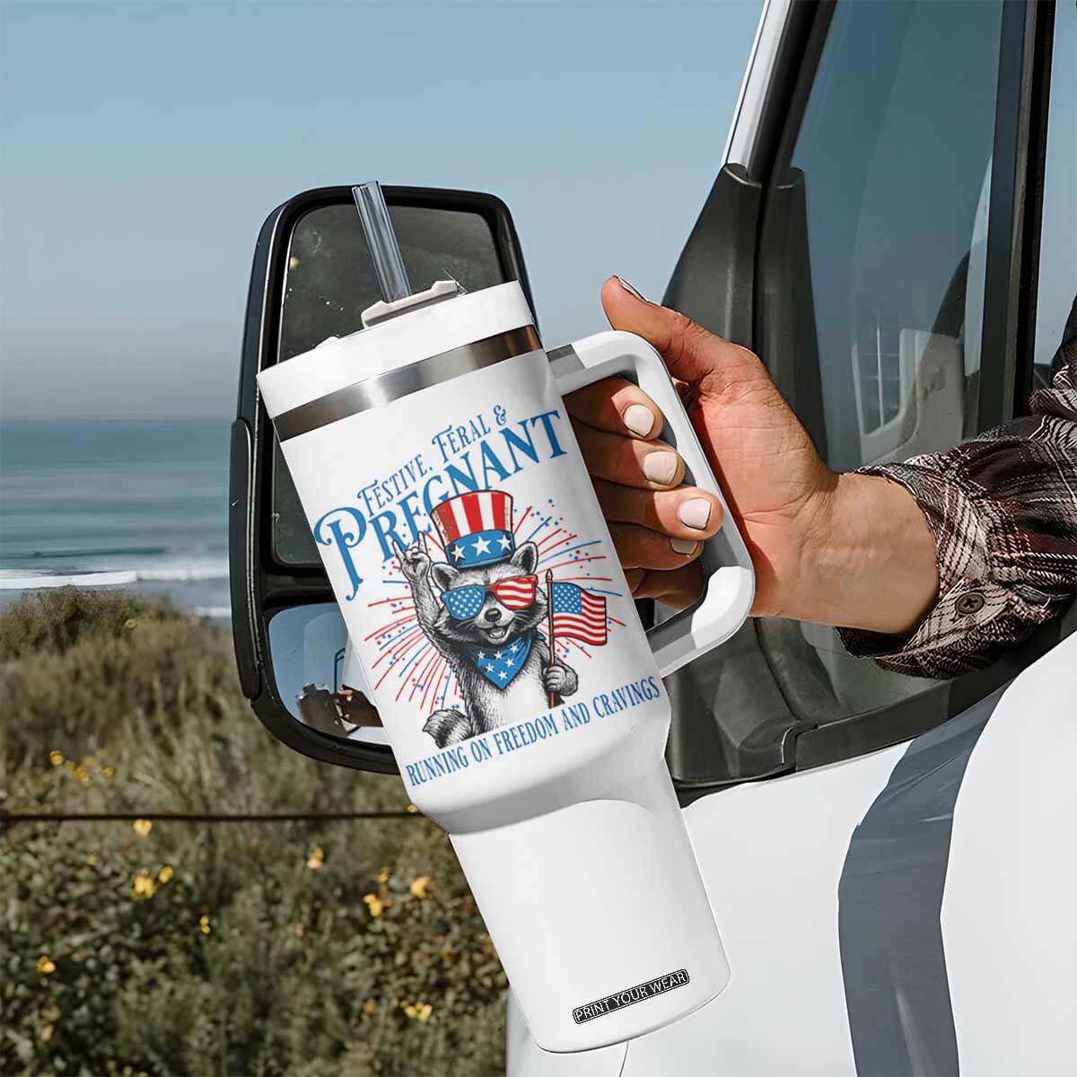 Funny Festive Feral and Pregnant Tumbler With Handle Running On Freedom And Cravings 4th of July Maternity Raccoon TS11 Print Your Wear