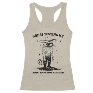 Funny God Is Testing Me And I Have Not Studied Racerback Tank Top Cowboy Racoon TS11 Sand Print Your Wear