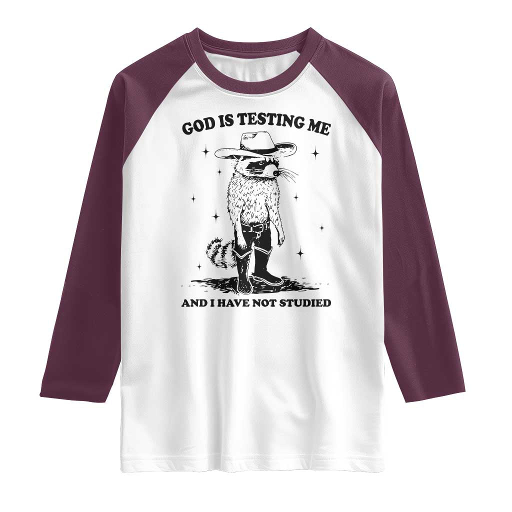Funny God Is Testing Me And I Have Not Studied Raglan Shirt Cowboy Racoon TS11 White Maroon Print Your Wear