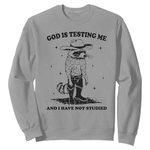 Funny God Is Testing Me And I Have Not Studied Sweatshirt Cowboy Racoon TS11 Sport Gray Print Your Wear