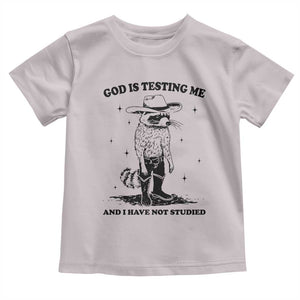 Funny God Is Testing Me And I Have Not Studied Toddler T Shirt Cowboy Racoon TS11 Ice Gray Print Your Wear