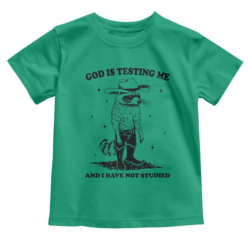 Funny God Is Testing Me And I Have Not Studied Toddler T Shirt Cowboy Racoon TS11 Irish Green Print Your Wear
