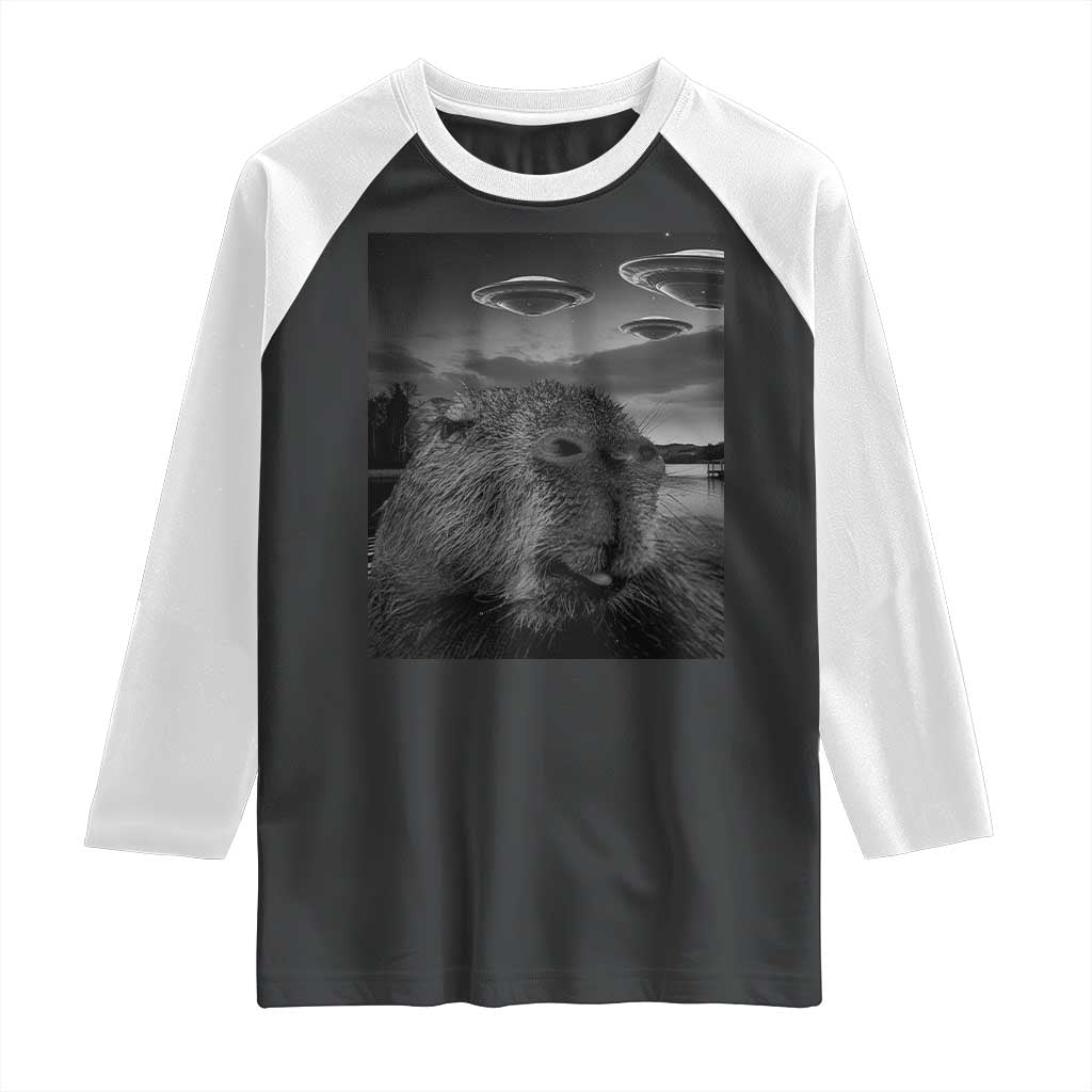 Funny Graphic Capybara Selfie with UFOs Weird Raglan Shirt TS10 Black White Print Your Wear