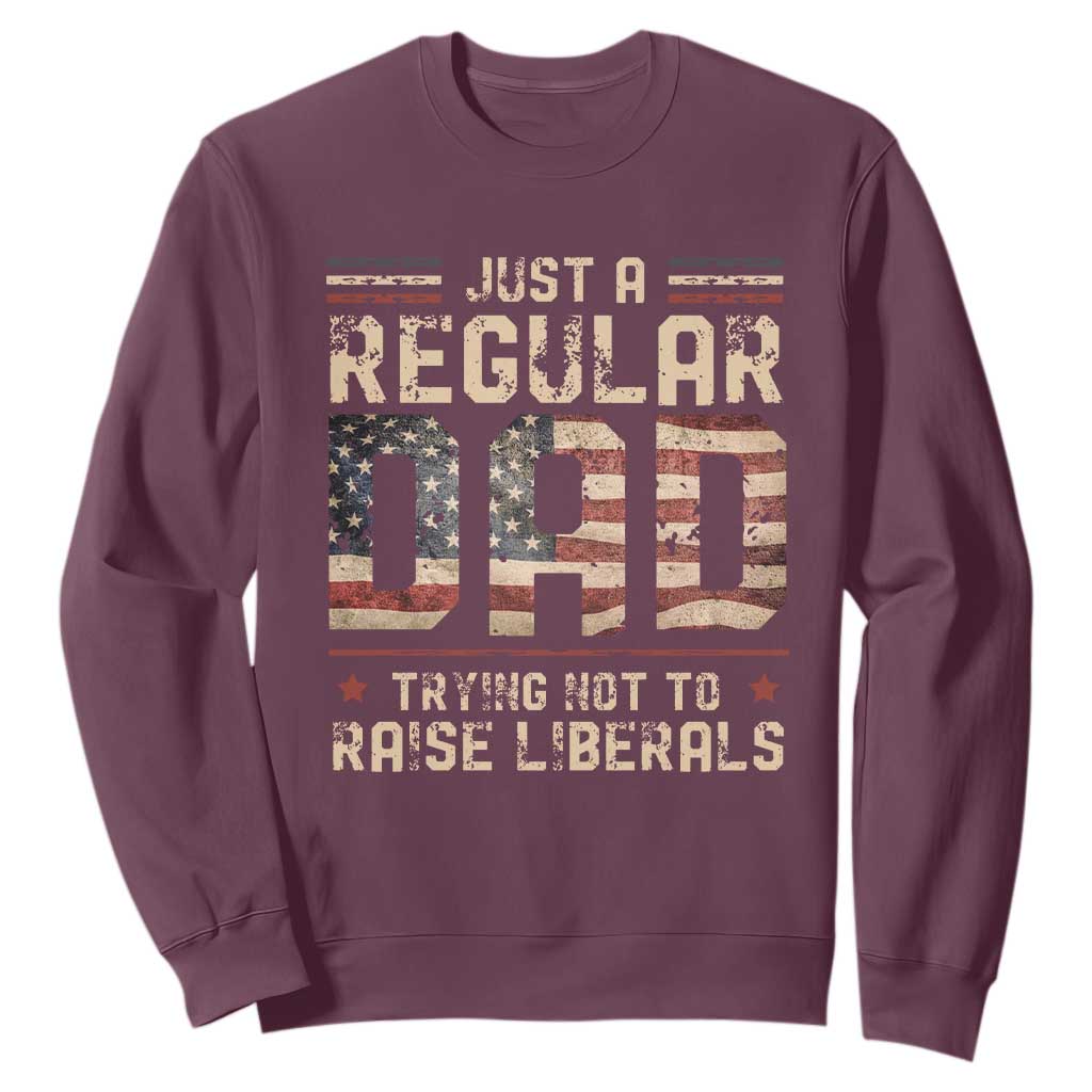 Funny Just A Regular Dad Trying Not To Raise Liberals Sweatshirt Fathers Day TS11 Maroon Print Your Wear