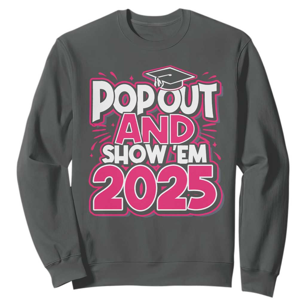 Funny Pop Out And Show Em 2025 Sweatshirt Pink Senior Class Of 2025 Graduation TS11 Dark Heather Print Your Wear