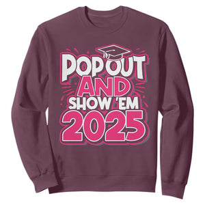 Funny Pop Out And Show Em 2025 Sweatshirt Pink Senior Class Of 2025 Graduation TS11 Maroon Print Your Wear