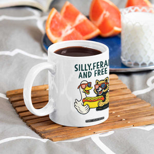 Silly Feral and Free Coffee Mug Funny Goose and Raccoon 4th of July Patriotic TS02 Print Your Wear