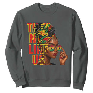 They Not Like Us Afro Queen Sweatshirt Melanin Magic Woman witth Headwrap and Sunglasses TS02 Dark Heather Print Your Wear
