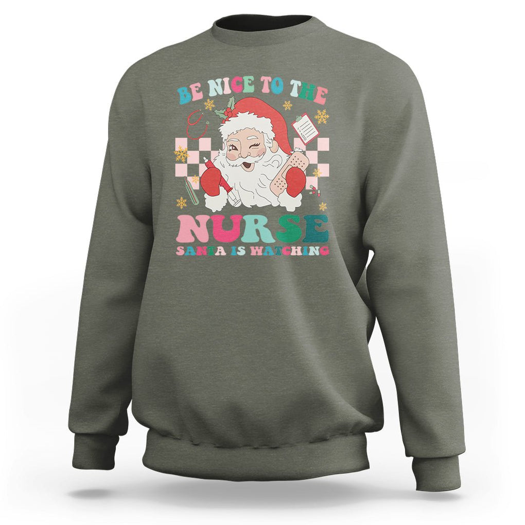 Be Nice To The Nurse Santa is Watching Christmas Sweatshirt TS09 Military Green Printyourwear