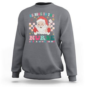 Be Nice To The Nurse Santa is Watching Christmas Sweatshirt TS09 Charcoal Printyourwear