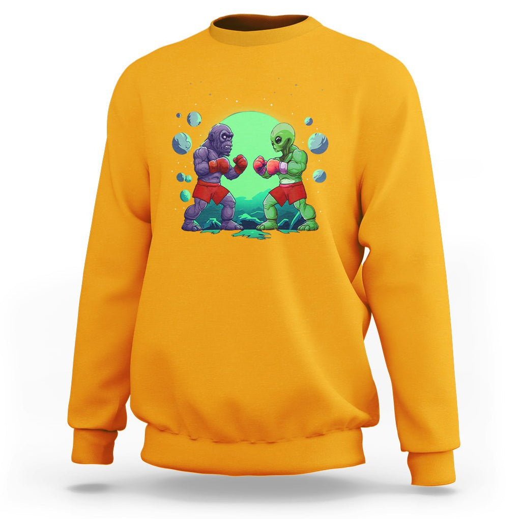 Bigfoot VS Alien Boxing Funny Sasquatch UFO Sweatshirt TS09 Gold Printyourwear