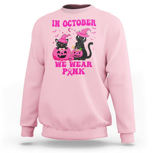 Breast Cancer Cat Sweatshirt In October We Wear Pink Black Cat Halloween Breast Cancer Awareness TS02 Light Pink Printyourwear