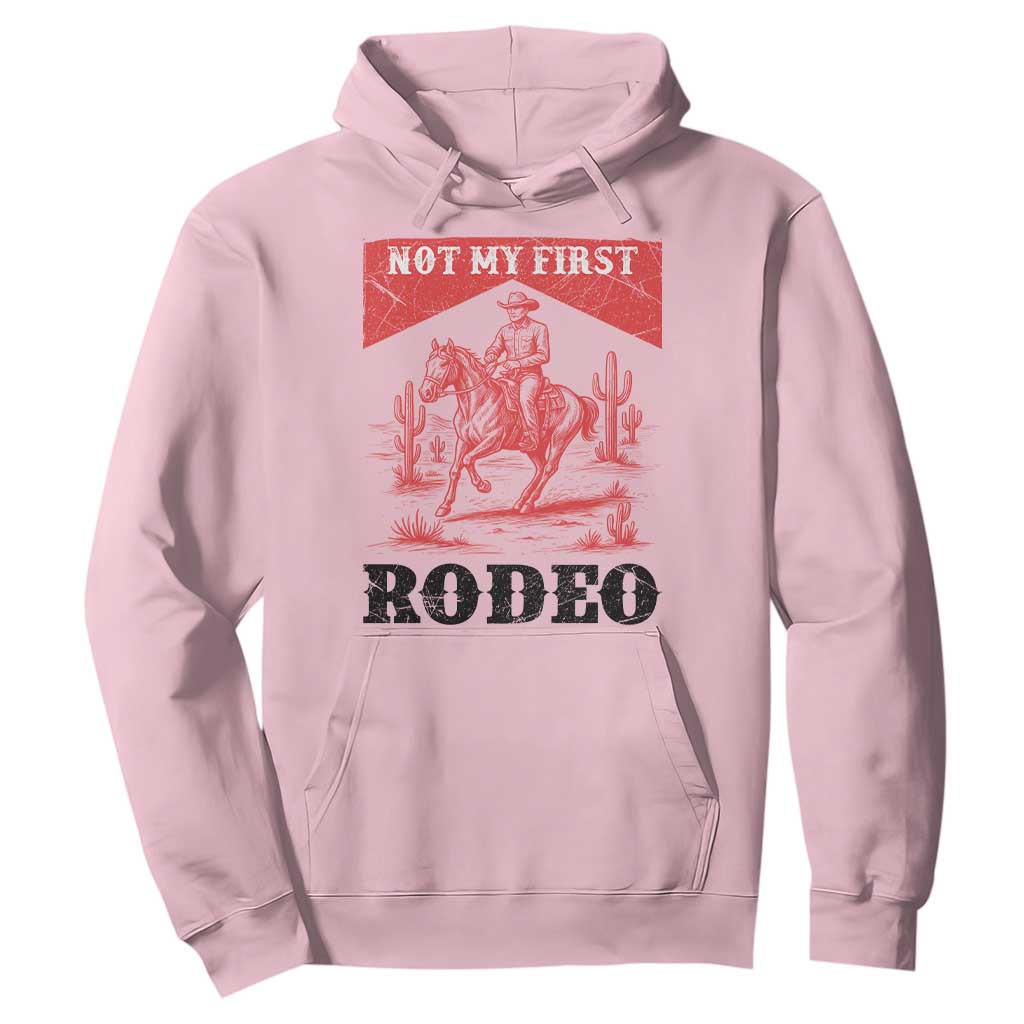 Not My First Rodeo Vintage Cowboy Graphic Hoodie Retro Western Desert Scene with Horse and Cactus TS02 Light Pink Print Your Wear