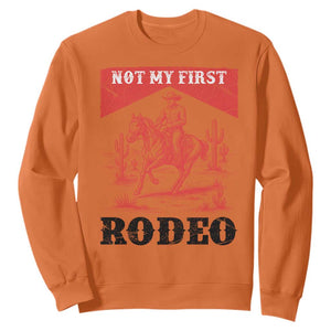 Not My First Rodeo Vintage Cowboy Graphic Sweatshirt Retro Western Desert Scene with Horse and Cactus TS02 Orange Print Your Wear