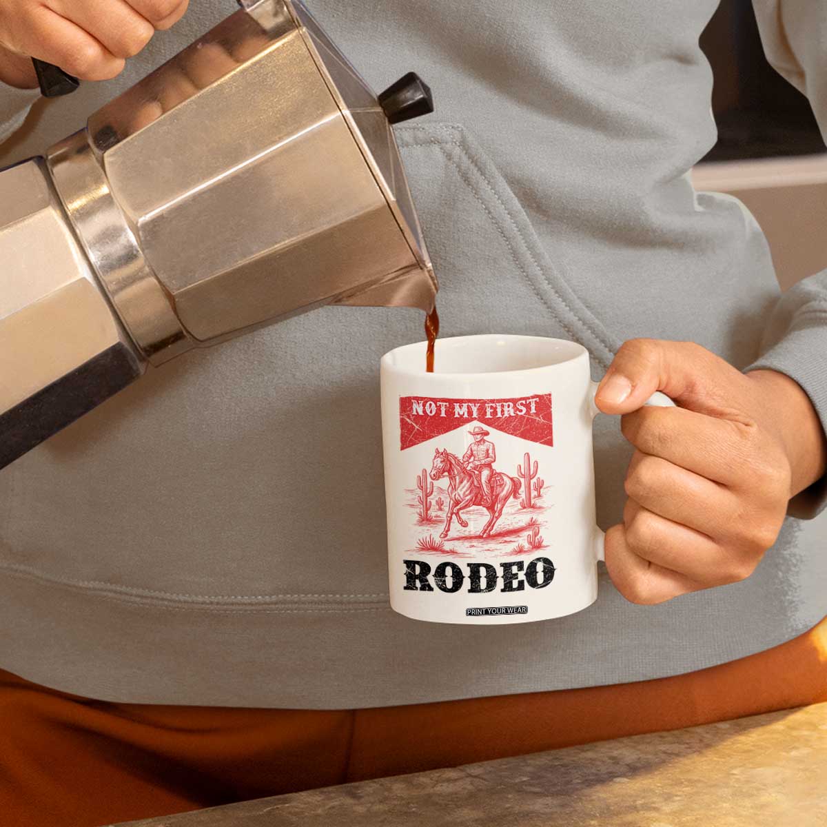 Not My First Rodeo Vintage Cowboy Graphic Coffee Mug Retro Western Desert Scene with Horse and Cactus TS02 Print Your Wear
