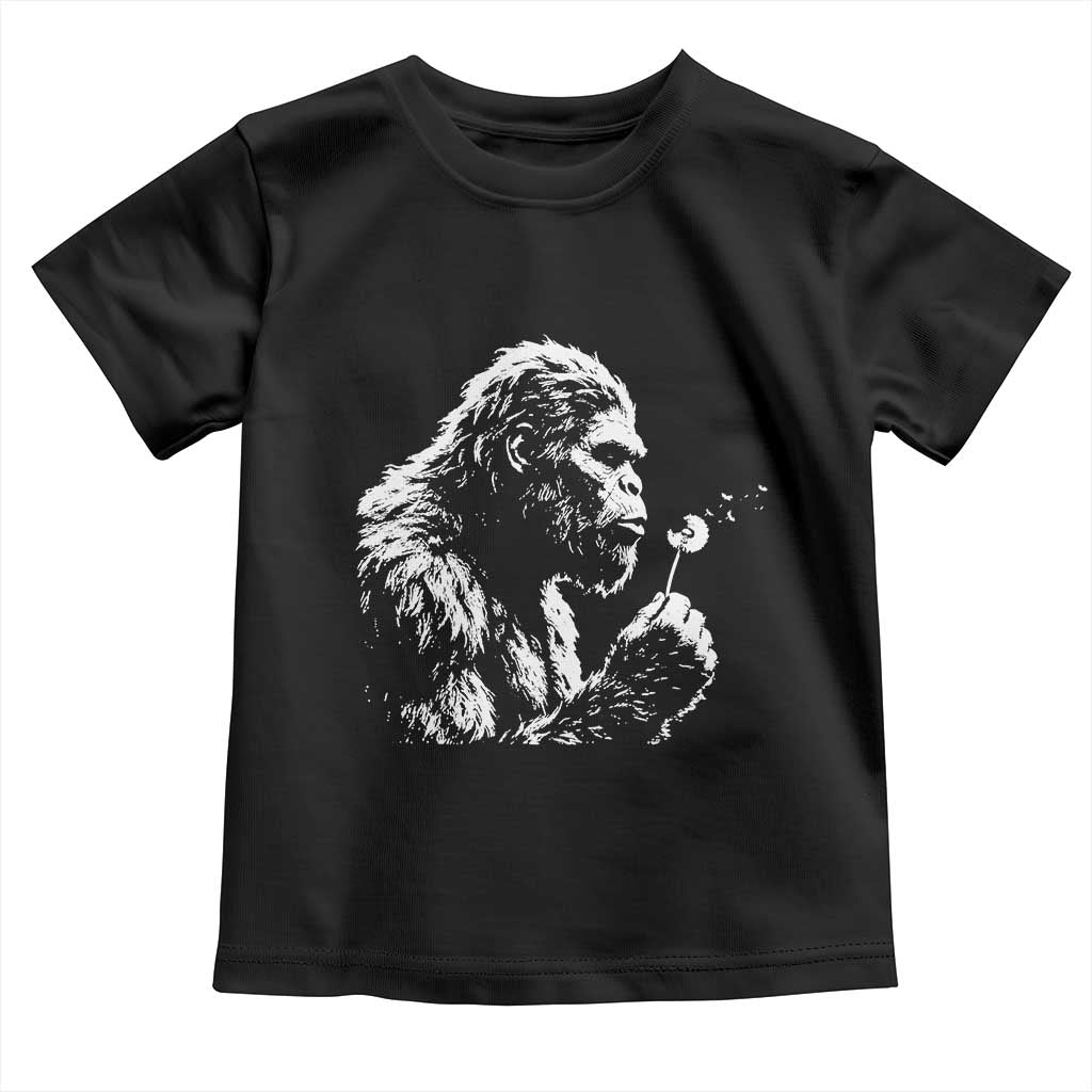 Bigfoot Blowing Dandelion Flower Graphic Toddler T Shirt Whimsical Sasquatch Profile Artistic Vintage Distressed TS02 Black Print Your Wear