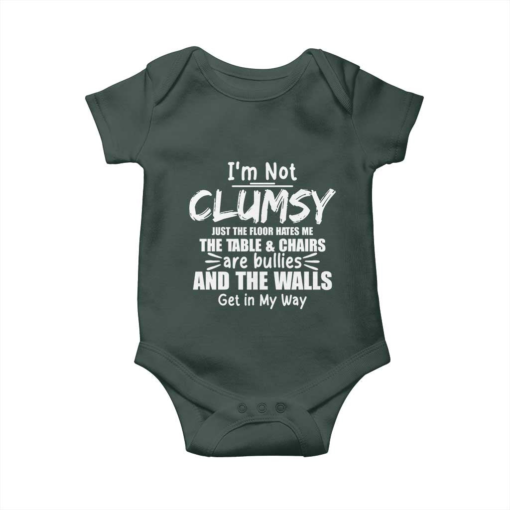 Funny Clumsy People Saying Baby Onesie The Floor Hates Me The Table And Chairs Are Bullies The Walls Get In My Way TS02 Print Your Wear
