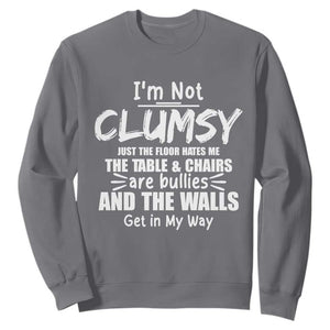 Funny Clumsy People Saying Sweatshirt The Floor Hates Me The Table And Chairs Are Bullies The Walls Get In My Way TS02 Charcoal Print Your Wear