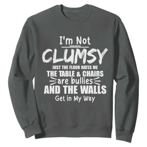 Funny Clumsy People Saying Sweatshirt The Floor Hates Me The Table And Chairs Are Bullies The Walls Get In My Way TS02 Dark Heather Print Your Wear