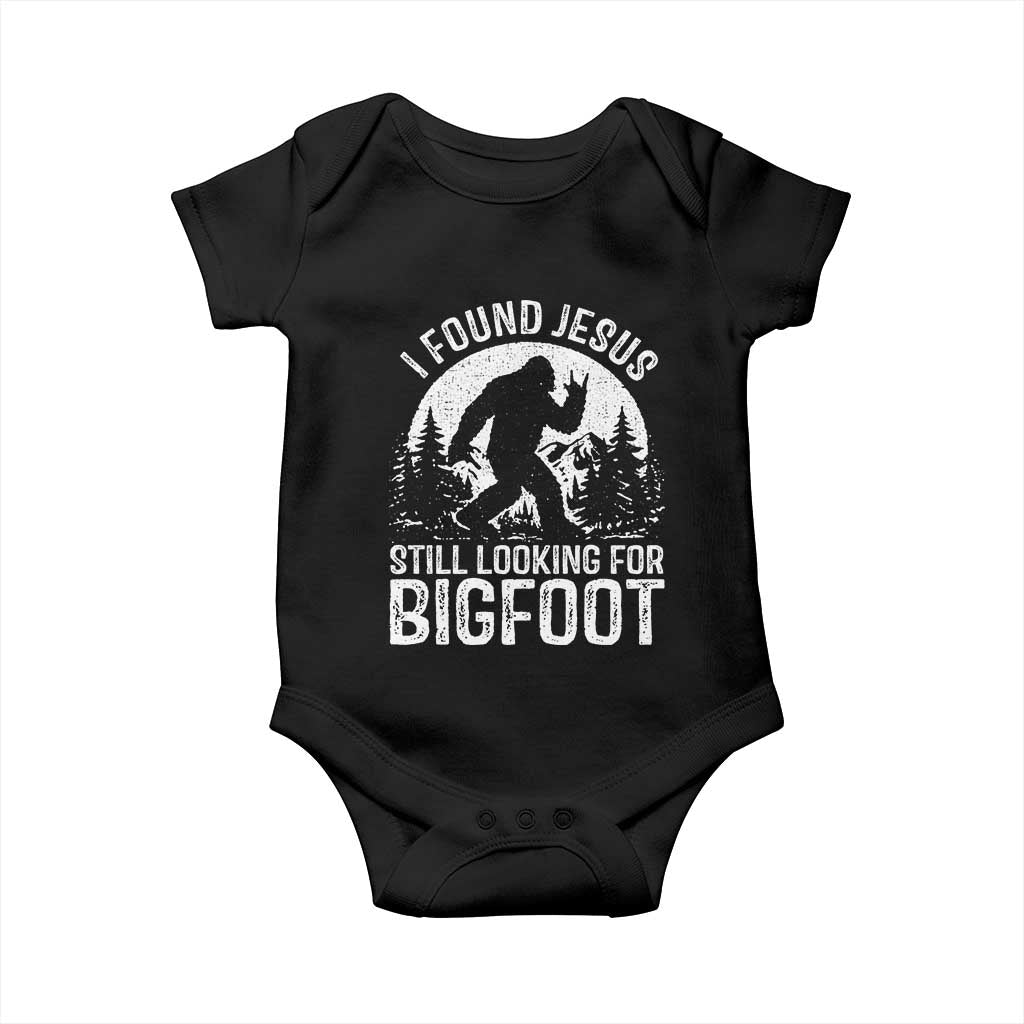Funny Christian Sasquatch Baby Onesie I Found Jesus Still Looking for Bigfoot Vintage Distressed Graphic TS02 Black Print Your Wear