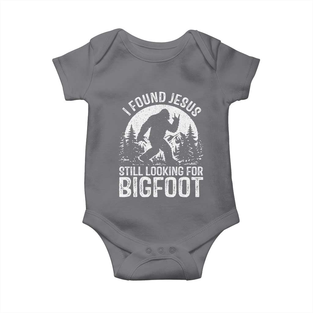 Funny Christian Sasquatch Baby Onesie I Found Jesus Still Looking for Bigfoot Vintage Distressed Graphic TS02 Charcoal Print Your Wear