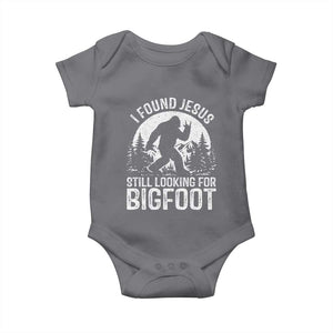 Funny Christian Sasquatch Baby Onesie I Found Jesus Still Looking for Bigfoot Vintage Distressed Graphic TS02 Charcoal Print Your Wear