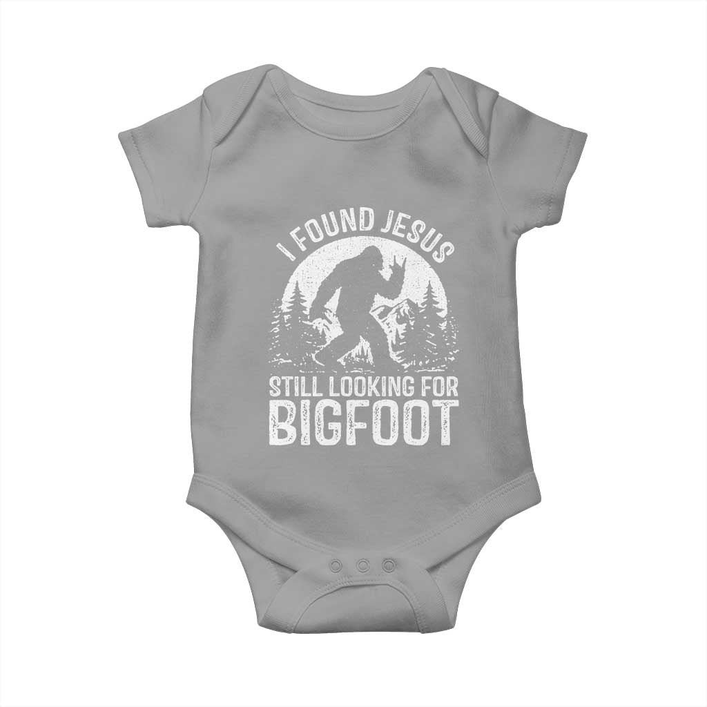 Funny Christian Sasquatch Baby Onesie I Found Jesus Still Looking for Bigfoot Vintage Distressed Graphic TS02 Sport Gray Print Your Wear