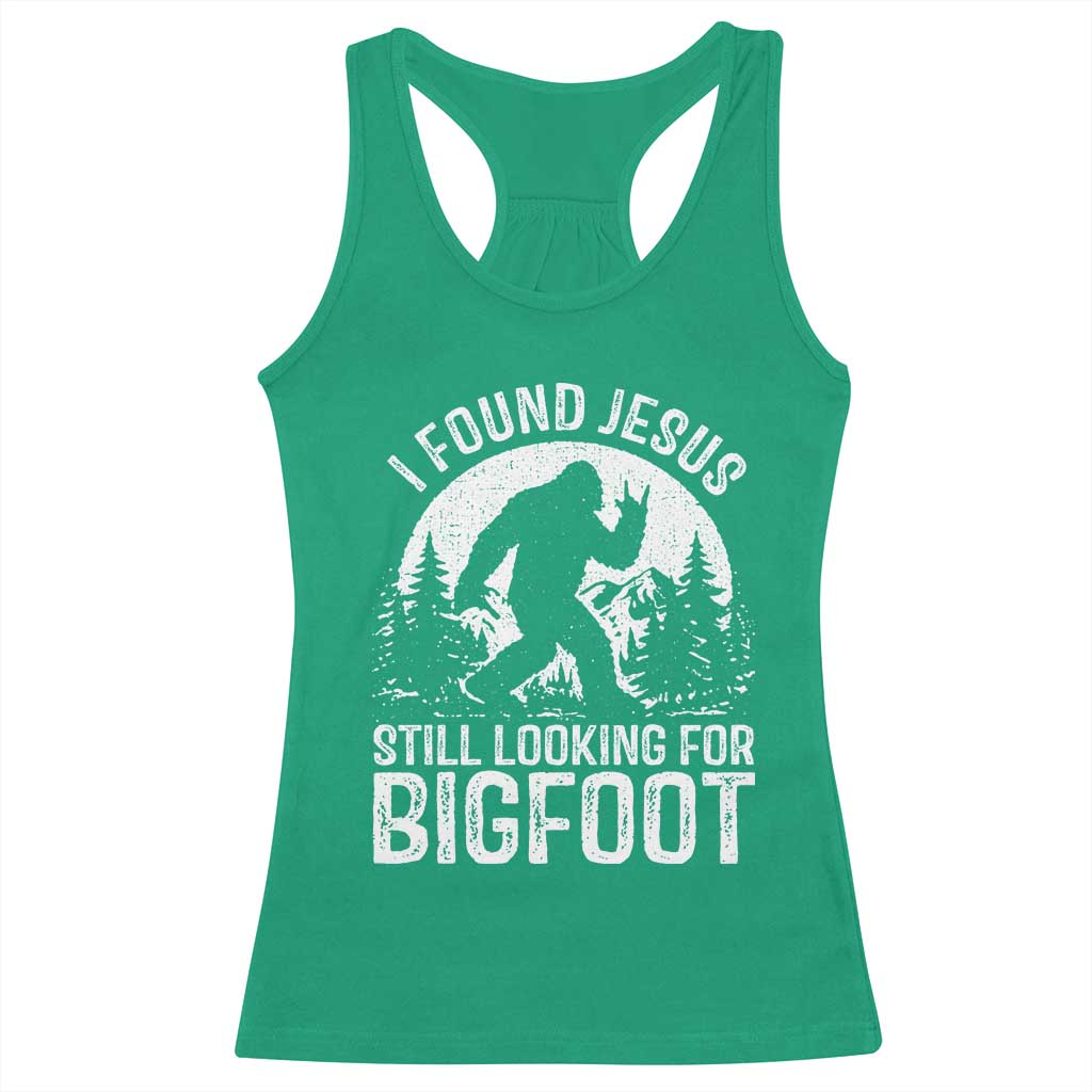 Funny Christian Sasquatch Racerback Tank Top I Found Jesus Still Looking for Bigfoot Vintage Distressed Graphic TS02 Irish Green Print Your Wear