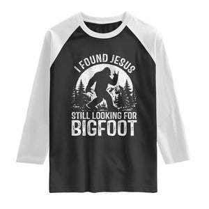 Funny Christian Sasquatch Raglan Shirt I Found Jesus Still Looking for Bigfoot Vintage Distressed Graphic TS02 Black White Print Your Wear