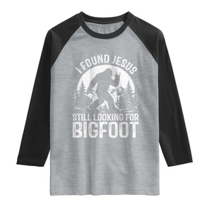 Funny Christian Sasquatch Raglan Shirt I Found Jesus Still Looking for Bigfoot Vintage Distressed Graphic TS02 Heather Gray Black Print Your Wear