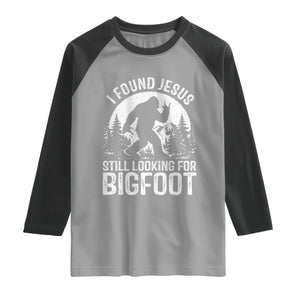 Funny Christian Sasquatch Raglan Shirt I Found Jesus Still Looking for Bigfoot Vintage Distressed Graphic TS02 Sport Gray Black Print Your Wear