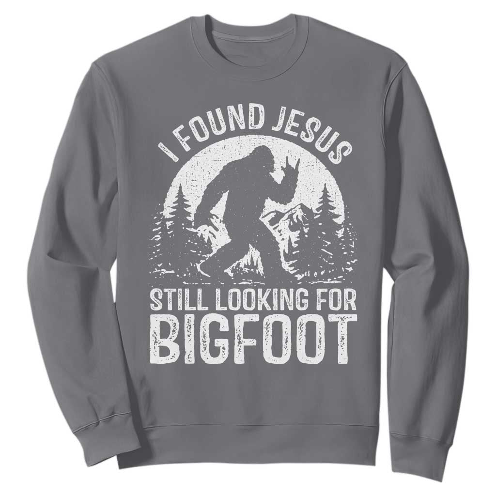 Funny Christian Sasquatch Sweatshirt I Found Jesus Still Looking for Bigfoot Vintage Distressed Graphic TS02 Charcoal Print Your Wear