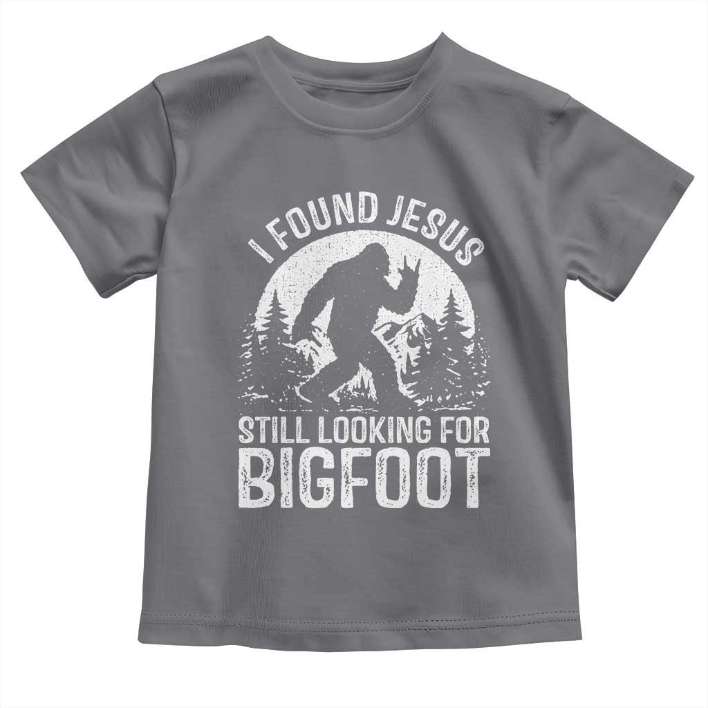 Funny Christian Sasquatch Toddler T Shirt I Found Jesus Still Looking for Bigfoot Vintage Distressed Graphic TS02 Charcoal Print Your Wear
