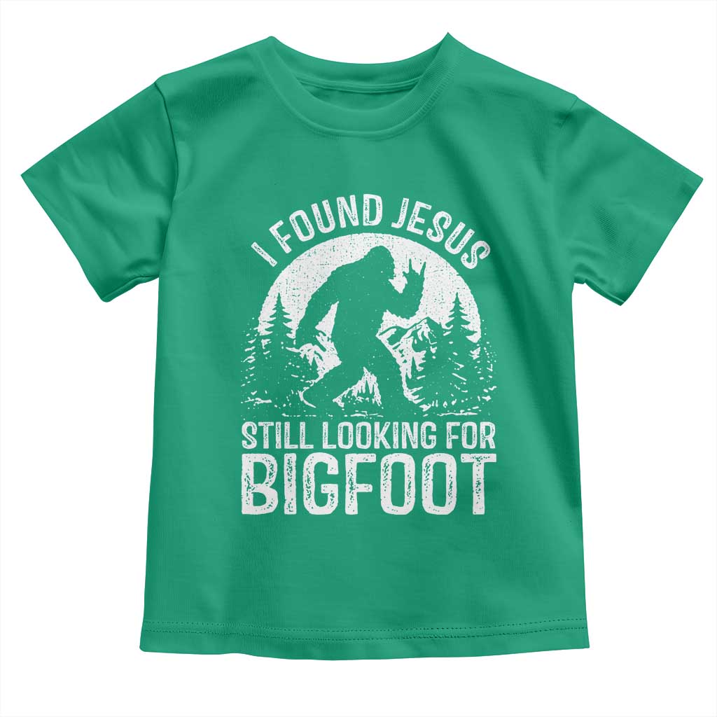 Funny Christian Sasquatch Toddler T Shirt I Found Jesus Still Looking for Bigfoot Vintage Distressed Graphic TS02 Irish Green Print Your Wear