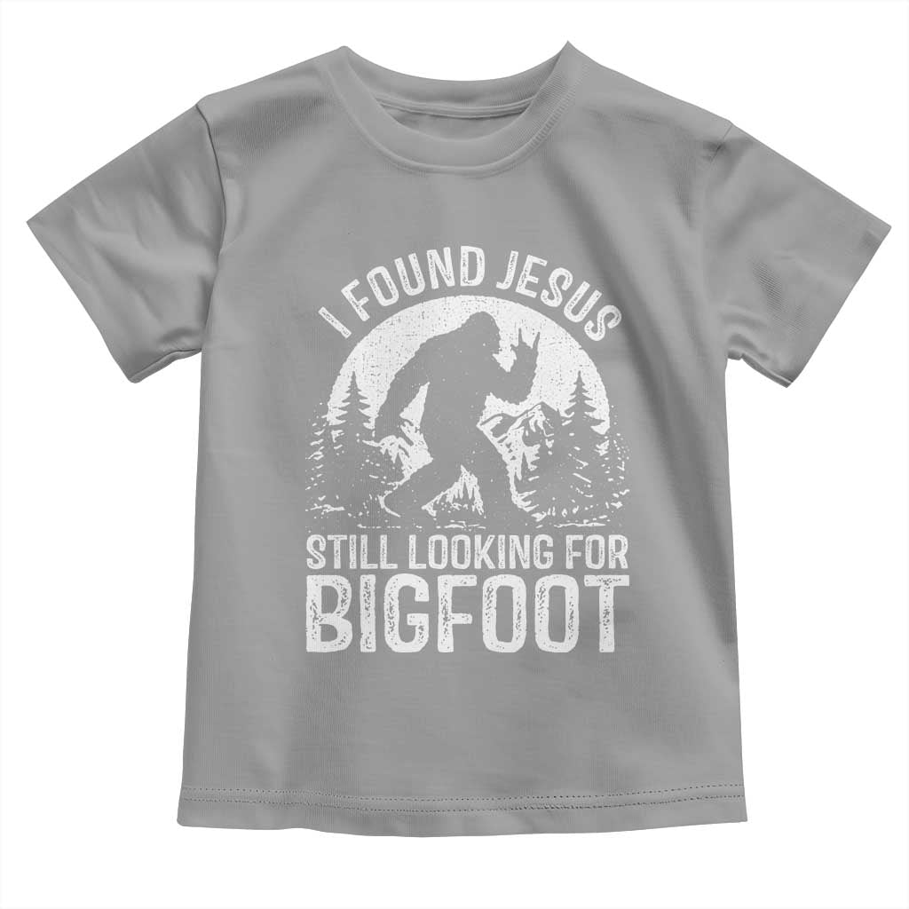 Funny Christian Sasquatch Toddler T Shirt I Found Jesus Still Looking for Bigfoot Vintage Distressed Graphic TS02 Sport Gray Print Your Wear