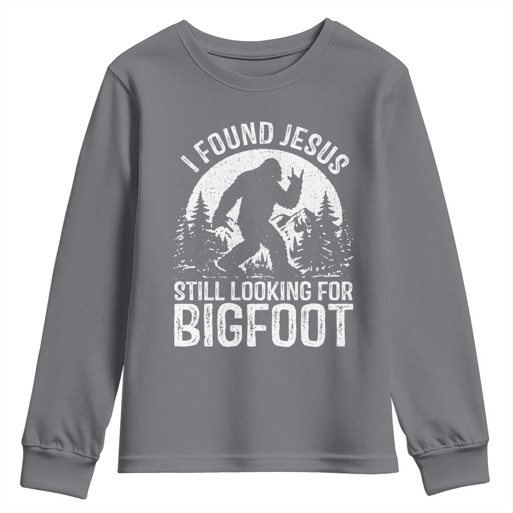 Funny Christian Sasquatch Youth Sweatshirt I Found Jesus Still Looking for Bigfoot Vintage Distressed Graphic TS02 Charcoal Print Your Wear