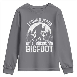 Funny Christian Sasquatch Youth Sweatshirt I Found Jesus Still Looking for Bigfoot Vintage Distressed Graphic TS02 Charcoal Print Your Wear