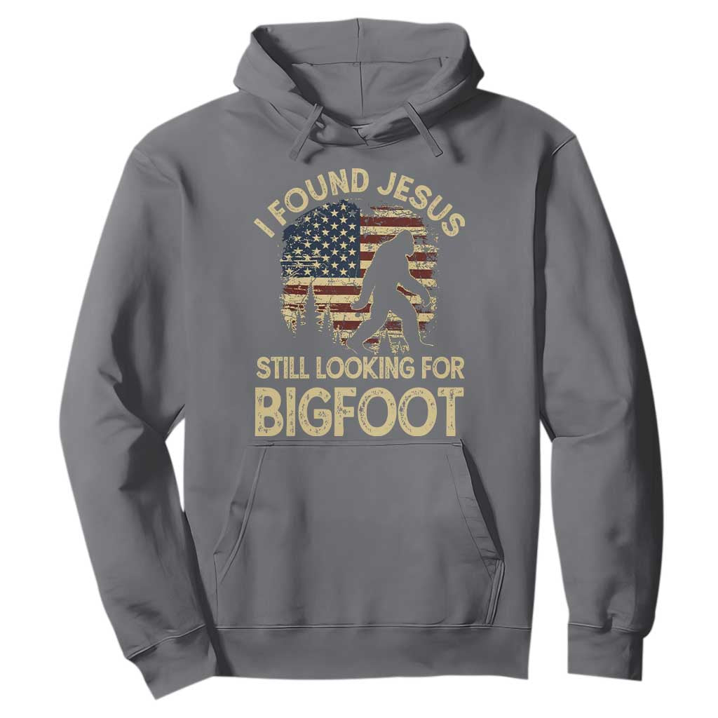 I Found Jesus Still Looking for Bigfoot Patriotic Hoodie American Flag Christian Religious Sasquatch Vintage TS02 Charcoal Print Your Wear