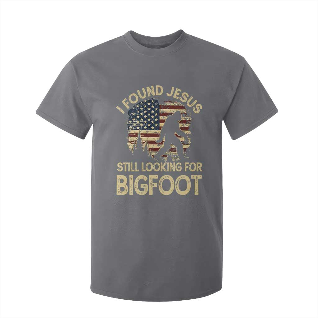 I Found Jesus Still Looking for Bigfoot Patriotic T Shirt For Kid American Flag Christian Religious Sasquatch Vintage TS02 Charcoal Print Your Wear