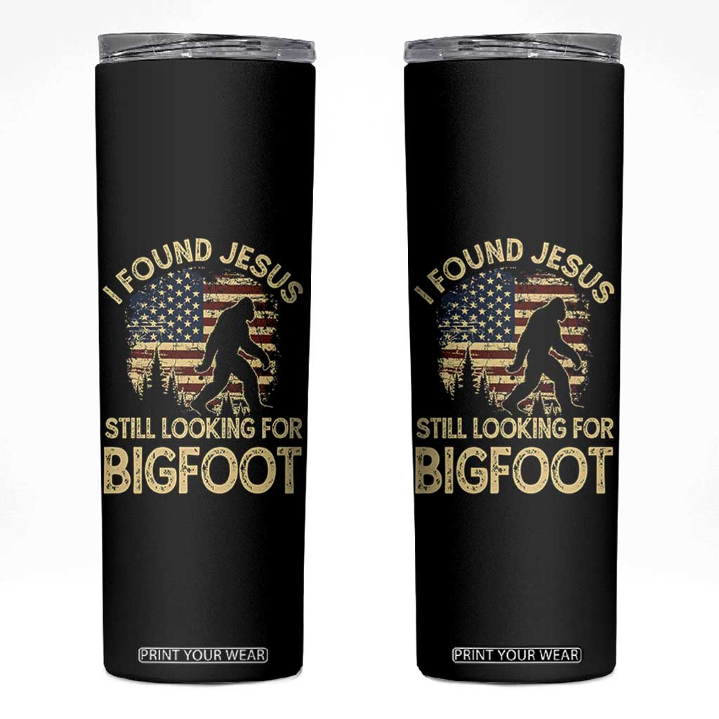 I Found Jesus Still Looking for Bigfoot Patriotic Skinny Tumbler American Flag Christian Religious Sasquatch Vintage TS02 Black Print Your Wear