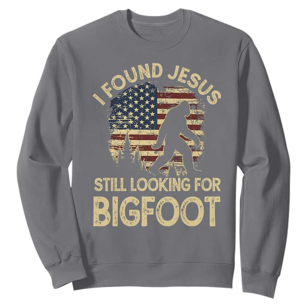 I Found Jesus Still Looking for Bigfoot Patriotic Sweatshirt American Flag Christian Religious Sasquatch Vintage TS02 Charcoal Print Your Wear