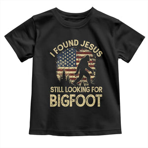 I Found Jesus Still Looking for Bigfoot Patriotic Toddler T Shirt American Flag Christian Religious Sasquatch Vintage TS02 Black Print Your Wear