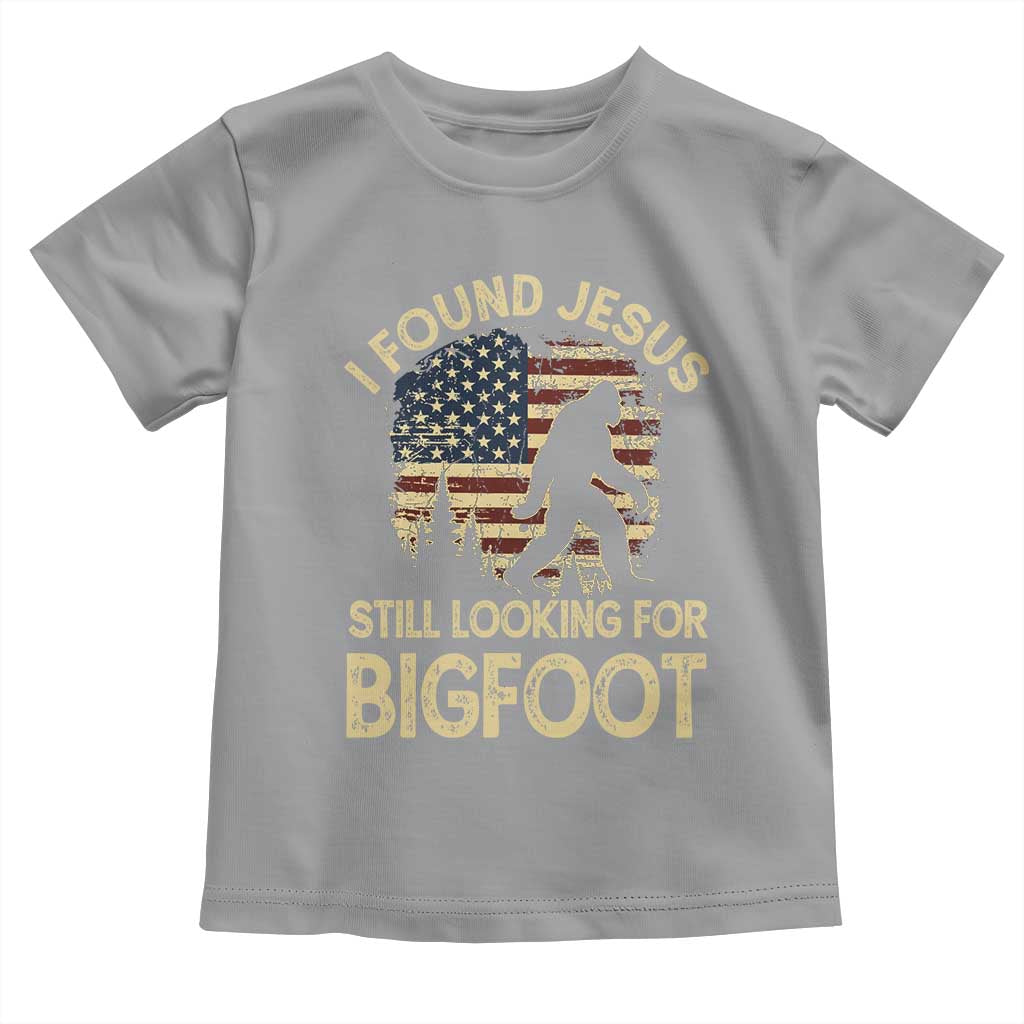 I Found Jesus Still Looking for Bigfoot Patriotic Toddler T Shirt American Flag Christian Religious Sasquatch Vintage TS02 Sport Gray Print Your Wear