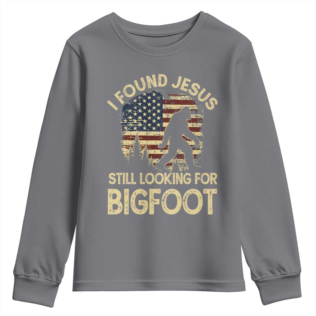 I Found Jesus Still Looking for Bigfoot Patriotic Youth Sweatshirt American Flag Christian Religious Sasquatch Vintage TS02 Charcoal Print Your Wear
