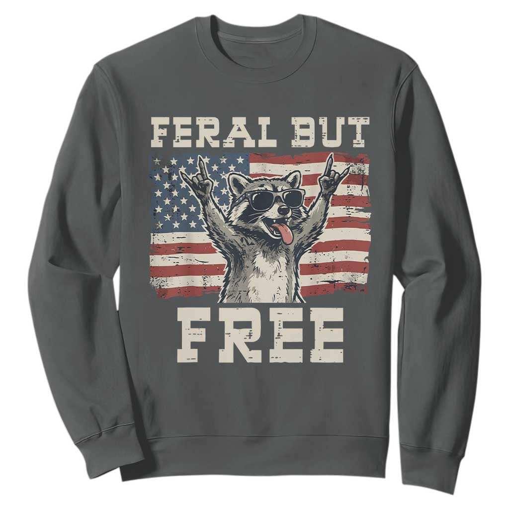 Feral But Free Funny Raccoon Patriotic Sweatshirt Cool American Flag Sunglasses Rock On Hand Signs Vintage USA Flag TS02 Dark Heather Print Your Wear